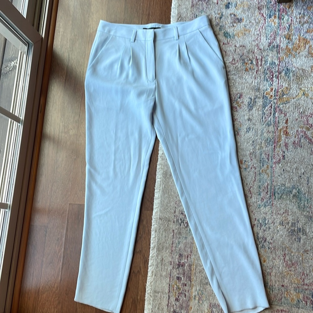 Jenni Kayne light blue colored dress pants. Size 4. Raw hem